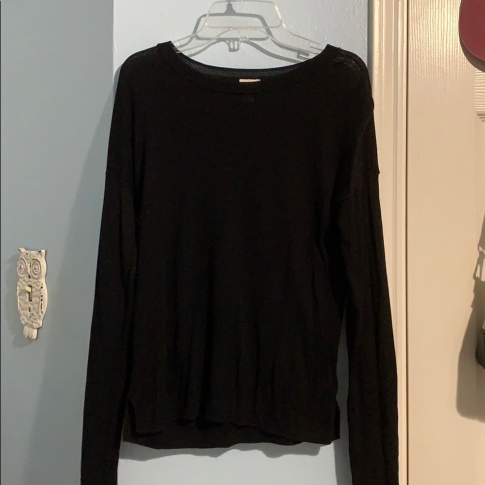 A New Day black sweater